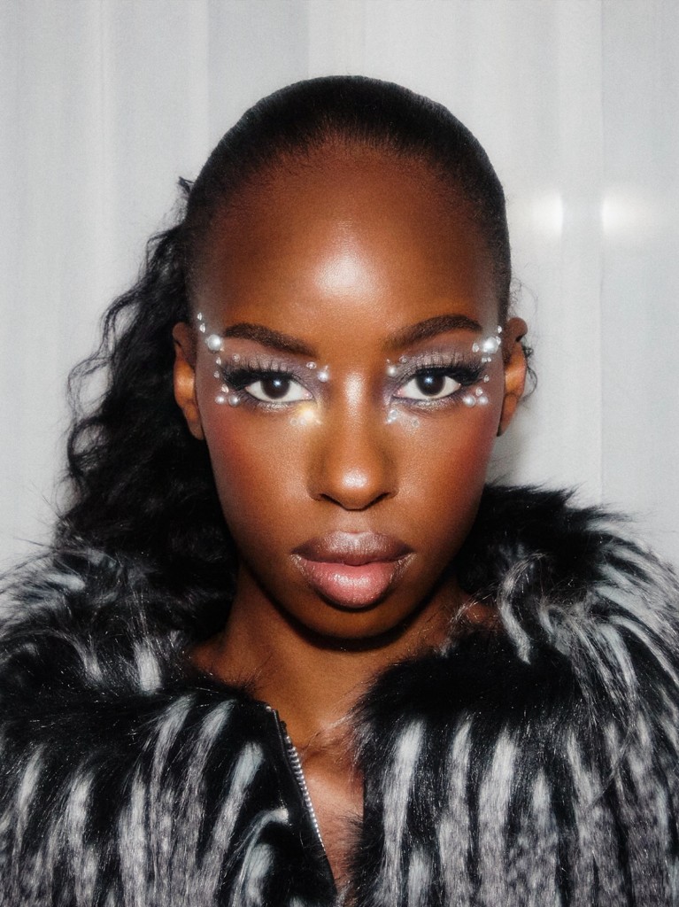 Beauty close-up with pearls set along the eye