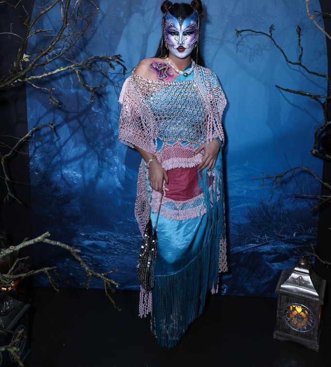 Full-length character makeup in blue and pink